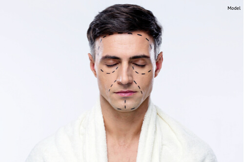 Man with closed eyes and marked with lines for plastic surgery-img-blog
